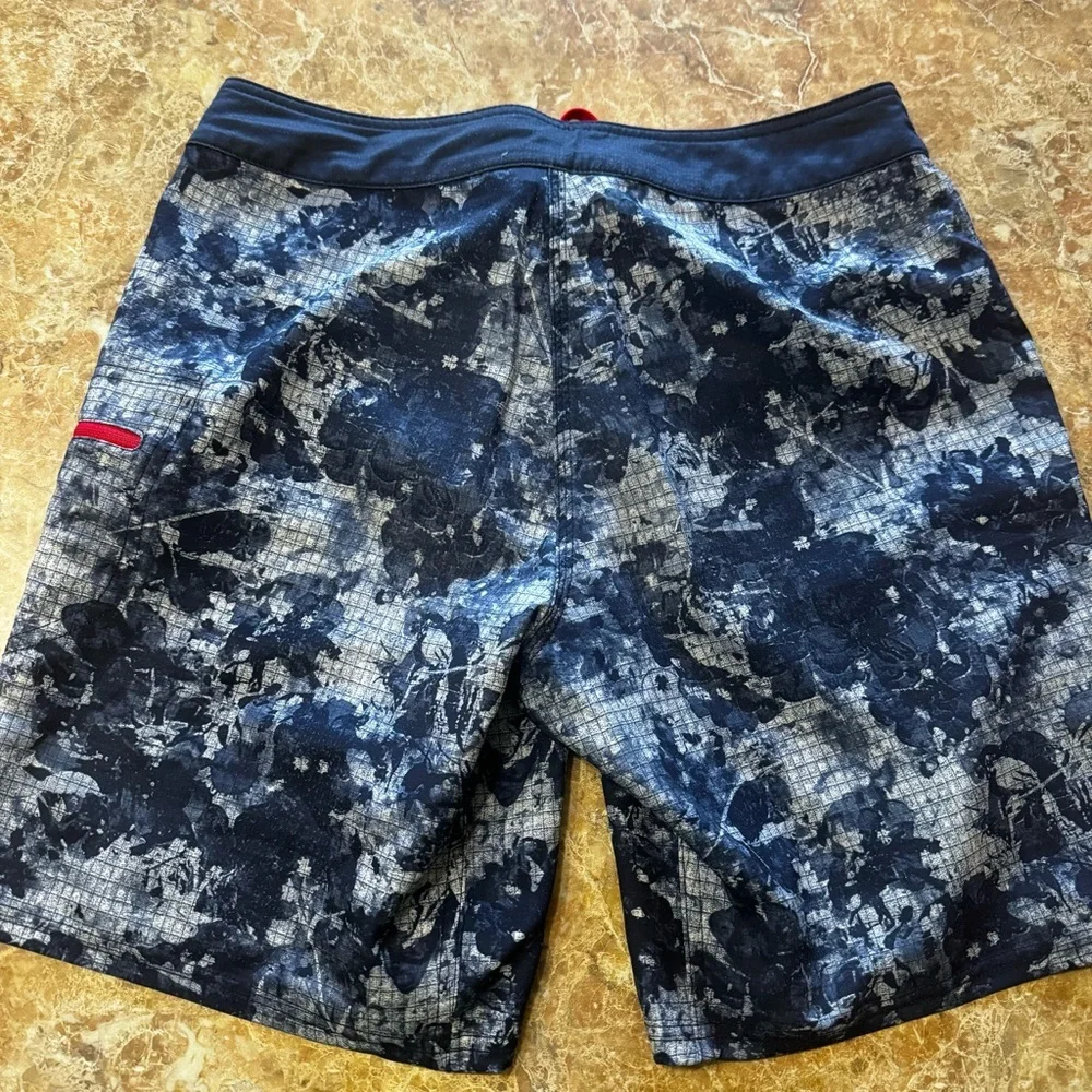 The North Face Olas Boardshorts Men’s 30 Navy Blue Red 9” Swim Shorts Side Zip